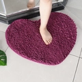 Deep purple heart-shaped chenille bath mat showing non-slip bathroom use - Deep purple