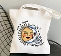White canvas tote bag featuring sun and moon print with I'm a Moon in Daylight text - STD438-P (Moon in Daylight Illustration)