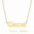 Detailed view of a gold Taurus zodiac pendant necklace with gothic lettering on a chain - Taurus (Gold)