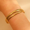 Polished gold-tone thin tubular bangle set for women in a minimalist stacked style - Thin Round Tube Glossy (9827)