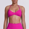 Front detail of rose red halter sports bra with center ruching and elastic fabric - Dragon Fruit