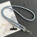 Detail of light blue adjustable 8mm nylon phone lanyard with silver metal clips and black patch - 8mm Dual Adjustable / Gray Blue
