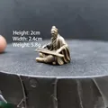 Miniature brass figurine of ancient scholar playing guqin, height 2cm, width 2.4cm - Elder Playing Zither