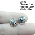 Macro view of 11mm antique silver alloy lantern beads with intricate dragon scale texture - 18# (Diameter 11mm Hole 1.8mm)