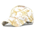 Detail of white baseball cap with intricate gold floral print and curved brim - White Gold Pattern Floral (Zhongguo Feng 06)