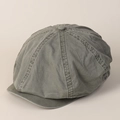 Detail view of washed gray-green cotton newsboy cap showing top stitching and button - Green
