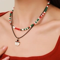 Close-up of double-layer beaded Christmas necklace with a cute snowman pendant - D1232 Double Layer Snowman Pendant