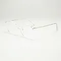 Modern transparent round TR90 eyeglasses frame with slim silver metal temples on white base - Transparent Silver