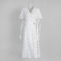 Close-up of white floral cotton midi dress with puff sleeves and wrap waist detail - S / Lavender