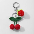 Handmade crochet cherry keychain with red knitted fruit and green leaves on silver ring - Red Crochet Strawberry Cherry Style