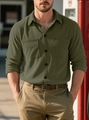 Detail of olive green corduroy work shirt with buttoned pockets and ribbed texture - S / Army Green