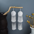 Bohemian silver tassel earrings with ethnic engraving hanging on natural branches - Boho Ornament Tassel Style E5082