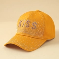Detail of yellow baseball cap featuring rhinestone KISS lettering and studded visor decor - One Size / KISS Ginger