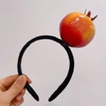 Funny black velvet headband featuring a realistic red and yellow pomegranate fruit decor - Pomegranate