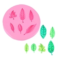 Pink round silicone leaf mold with six cavities and green resin leaf samples - Six-hole Leaf Shape (50-1022) / Pink
