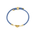Close-up of light blue woven bracelet with engraved gold bead and matte star pendant - Sky Blue (Star)