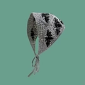 Close-up of handmade gray crochet headscarf with black bat patterns and knitted textures - Grey Black Bat