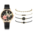 Detailaufnahme von Damen Quarzuhr Set mit Blumenzifferblatt und vier Armbändern - Armband / Schwarz