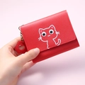 Red tri-fold short wallet for women featuring a cartoon cat print and flower charm - Red