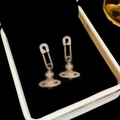 Boucles d'oreilles épingles à nourrice dorées avec cristaux et pendentif planète - Style d'Orb d'Épingle de Sûreté Argenté