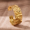Detail of 18K gold plated stainless steel cuff bracelet with luxury hammered texture finish - Hammered Finish