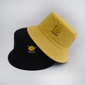 Close-up of lemon embroidery and textured cotton fabric on black and yellow bucket hats - Adult 55-58cm / Lemon Yellow