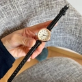 Women's quartz watch with rose gold case, white dial, and black leather strap - Black Strap