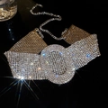 Macro detail of luxury silver choker featuring oval centerpiece and dense rhinestone weaving - Silver