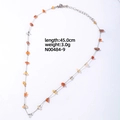 Feine silberne Edelstahlhalskette mit orangefarbenem Naturstein und Gewichtsangabe - Orange