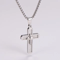 Macro detail of silver layered cross pendant with Spanish Lord's Prayer engraving - Silver (Steel)