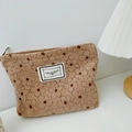Beige floral corduroy makeup bag with Time To Party label and secure zipper closure - Brown Flower