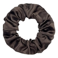 Detail of soft silk-like satin scrunchie texture in deep chocolate brown fabric - Coffee