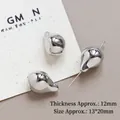Dettaglio macro di perline a goccia d'argento lucide per la creazione di gioielli - 7# (13x20mm)