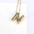 18k gold plated bubble letter N pendant necklace with zircon stones on a beaded chain - Letter N