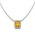 Macro shot of yellow rectangular zircon necklace with silver halo setting and tennis chain - Yellow