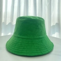 Detailed close-up of vibrant green terry cloth fabric texture on a soft bucket hat - M (56-58cm) / Green