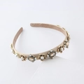 Detailed view of beige fabric headband with vintage gold flower gems and pearls - Beige Fabric Thickened Style (4849602528666) / Brown