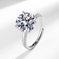 Elegant silver ring featuring a round brilliant-cut moissanite and micro-pave side stones - Four-claw Women's Ring 5 Carats Ljz-20 / Adjustable Open