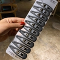 Set of 10 matte black metal BB hair clips for women on a white display card - Large Waterdrop 10-Piece Set