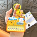 Porte-clés piano créatif jaune avec chien de dessin animé, notes de musique et clochette - Pendentif Piano Chiot / Jaune
