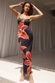 Macro detail of bodycon dress showing elegant lily flower print on black fabric - Red (Black Base Red Floral)
