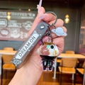 Creative black and gold astronaut keychain with purple glitter doll and dream on strap - Gold Black Astronaut Planet