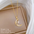 Detailed view of gold moon and star zircon necklace on jewelry box with size specs - Star Moon Inlaid Style (F420) / Gold