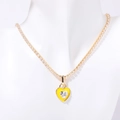 Gouden tennis ketting met een grote hartvormige zirkonia hanger voor dames - Geel