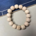 Natural camphor wood prayer beads in light beige finish with visible grain texture - 15mm*15 Beads Old Shape style