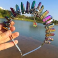 Close-up of rainbow crystal halo crown with silver sun pendant and teardrop beads - Multicolor/Sun/AB Colorful Pendant