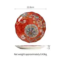 Exotic orange 9-inch ceramic steak plate with floral patterns and side view details - Brasilia (9 Inch)