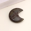 Polished crescent moon natural stone pendant in dark grey with reddish brown veins - Picture Jasper