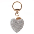 Close-up of sparkling silver rhinestone heart keychain with elegant gold metal ring - Silver