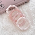 Set di quattro elastici per capelli a spirale nei toni rosa e bianco su carta ruvida - 2# Set da 4 pezzi Rosa